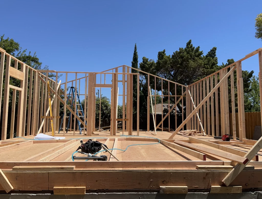 A house being built with wood framing.